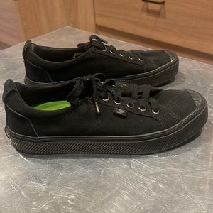 Cariuma black suede shoes